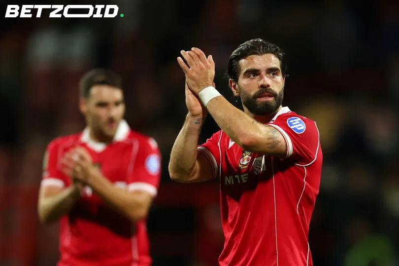 Elliot Lee says goodbye to Wrexham: 'I feel very lucky to have been part of something incredible'.