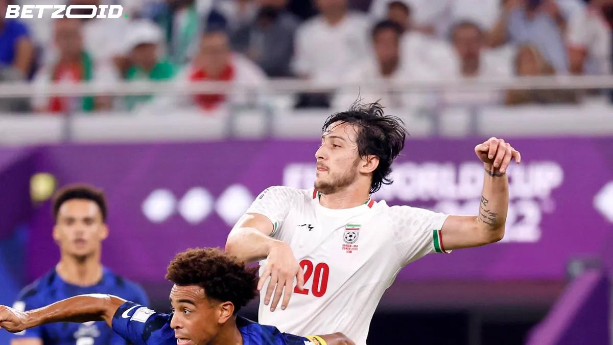Iran's third-highest scorer is home watching the World Cup — and politics put him there.