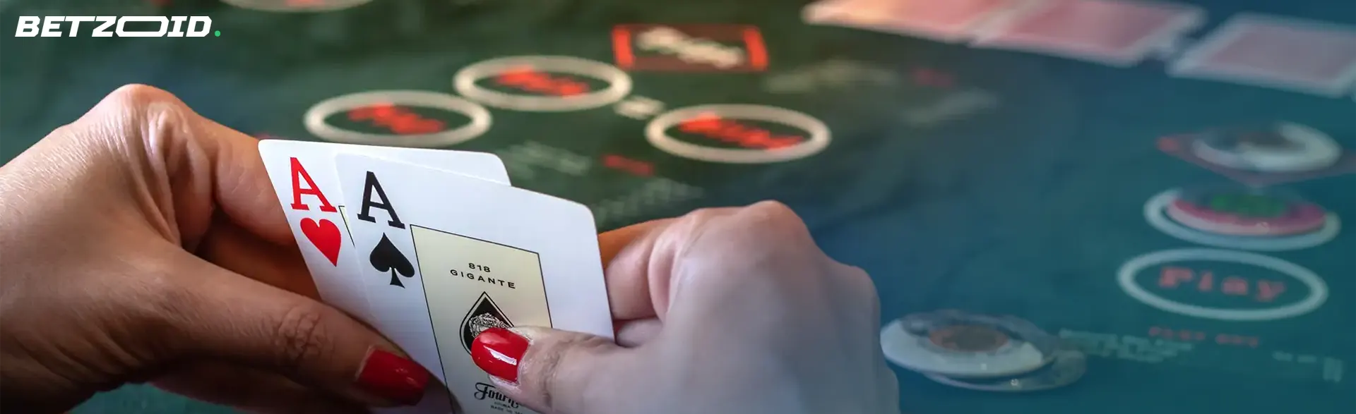 Hands holding cards at reputable online casinos.