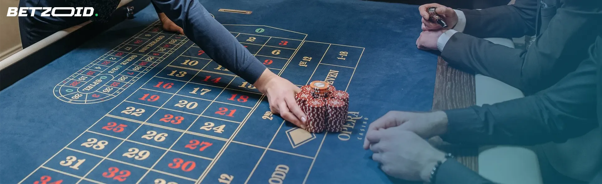 People playing at the table at online roulette casinos in Canada.