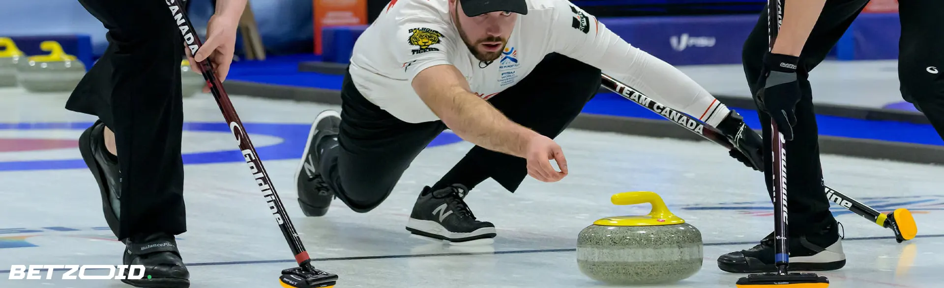 Close-up of a curling player in action, symbolizing the best betting sites in New Brunswick.