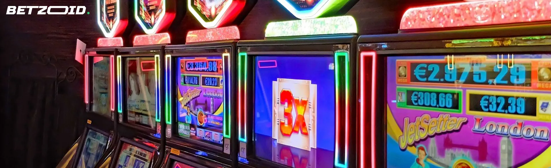 Vibrant display of slot machines, indicating various game titles and jackpot amounts.