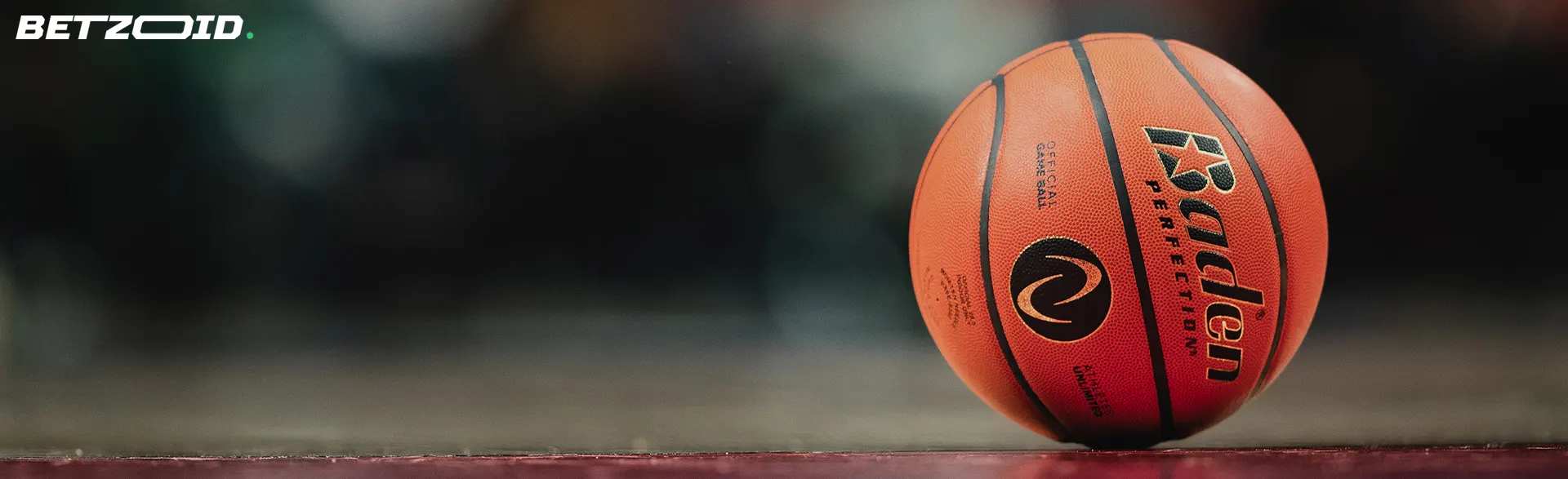 A close-up shot of a basketball on a court, representing Manitoba betting sites with a focus on sports and activities.