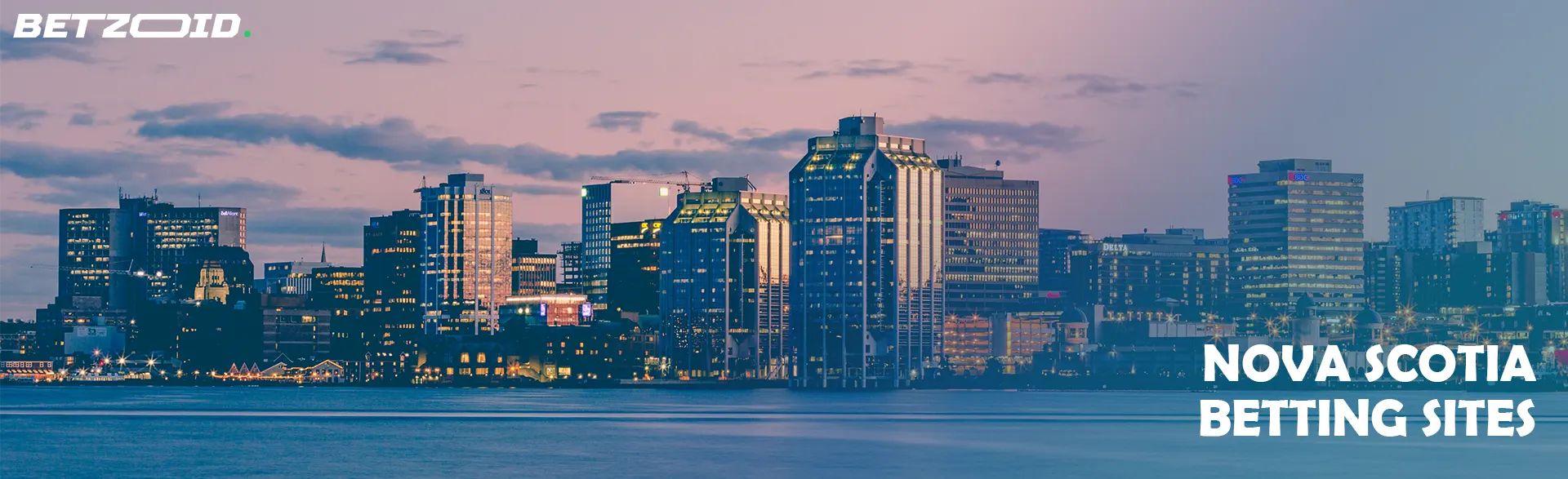 A skyline view of a city by the water at dusk, representing Nova Scotia betting sites.