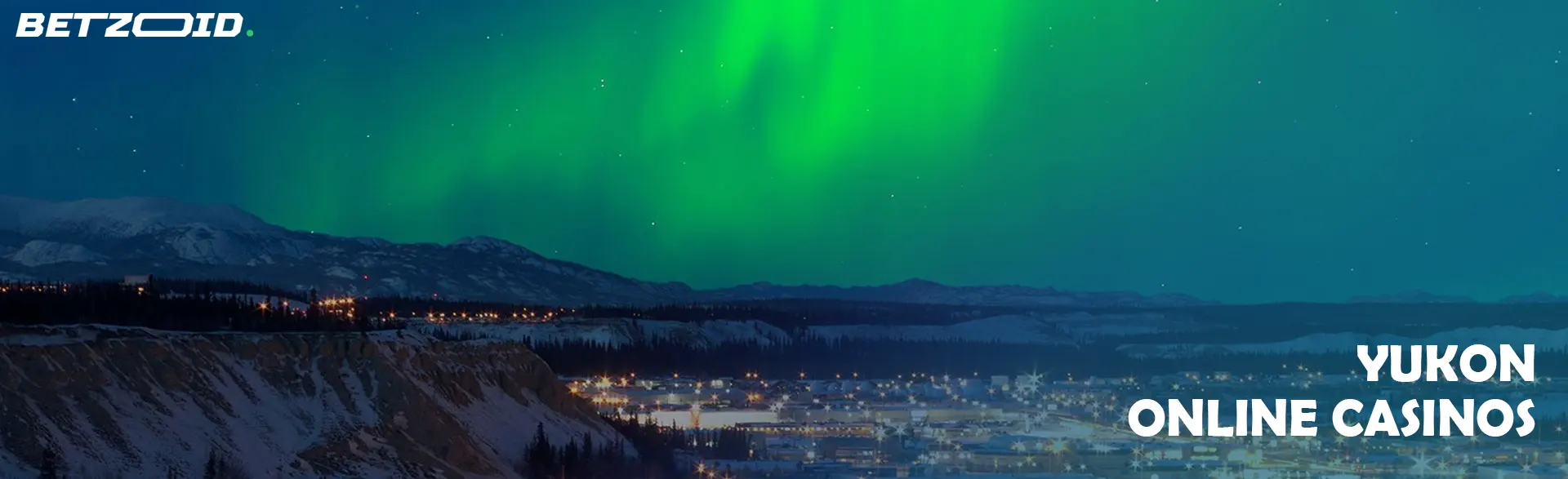 Aurora Borealis over a snowy landscape in Yukon, highlighting the unique allure of Yukon online casinos.