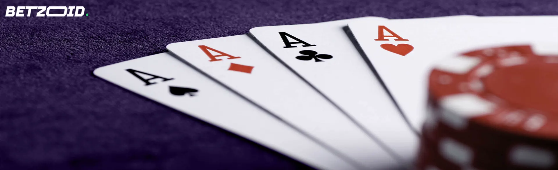 Four aces and poker chips in casino with 100% match deposit bonus.