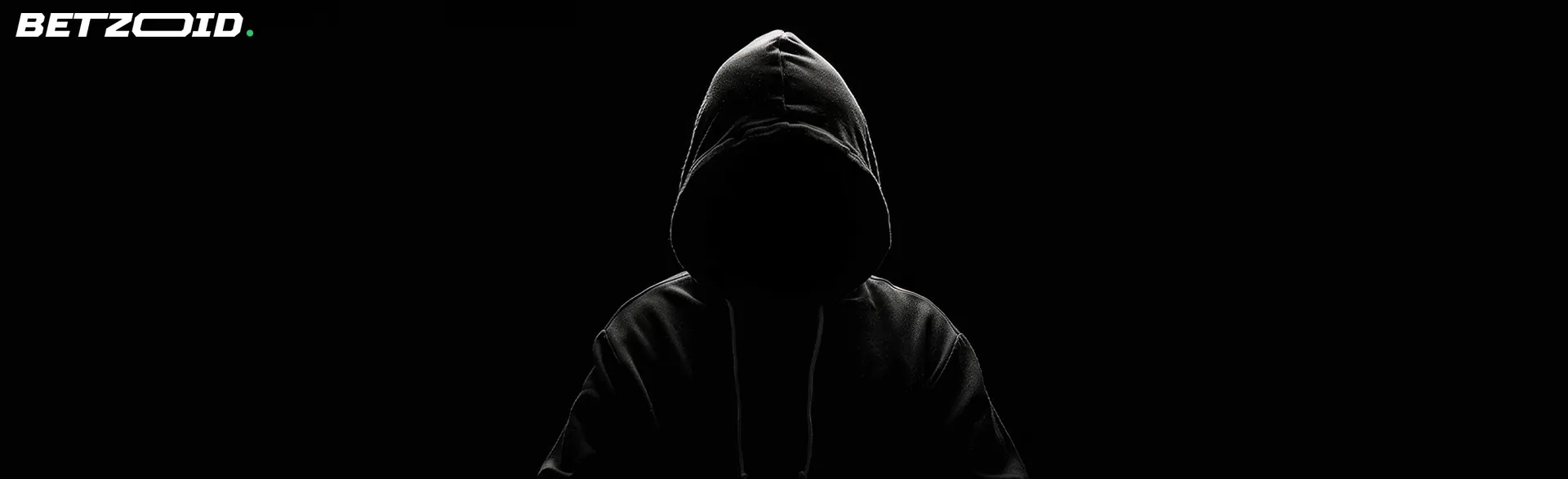 Mysterious figure in a black hoodie, symbolizing the privacy and anonymity offered by sports betting sites in Canada.