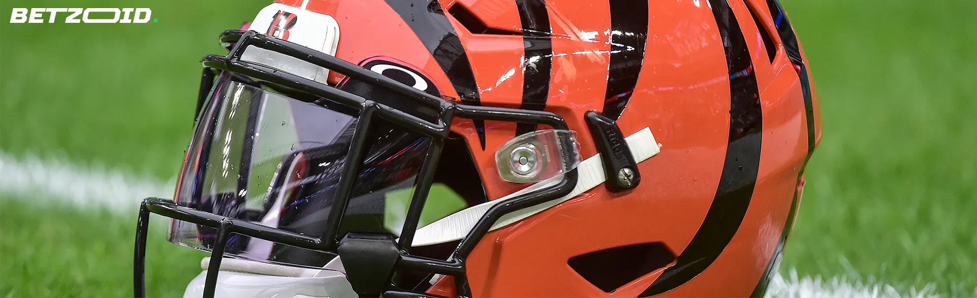 A close-up of an NFL helmet on the field, symbolizing the best NFL betting sites in Canada, catering to passionate sports bettors looking for top platforms to place their bets.
