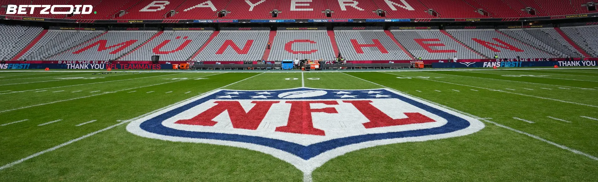 NFL field with a prominent logo at Bayern Munich stadium, highlighting the best online betting site for football in Canada.