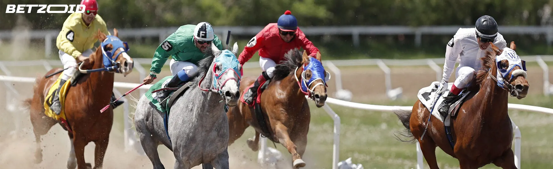 Jockeys riding horses in a competitive race, highlighting horse racing betting sites in Canada.