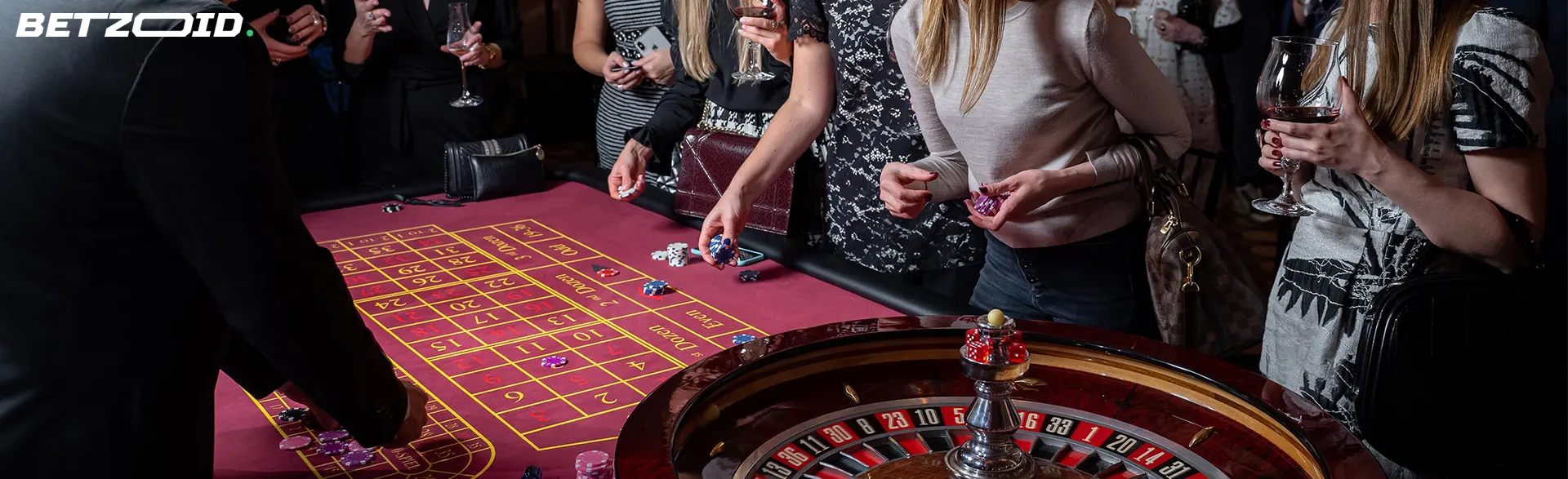 A group of people enjoying a game of baccarat at an online baccarat casino in Canada, with a vibrant atmosphere and engaging gameplay.