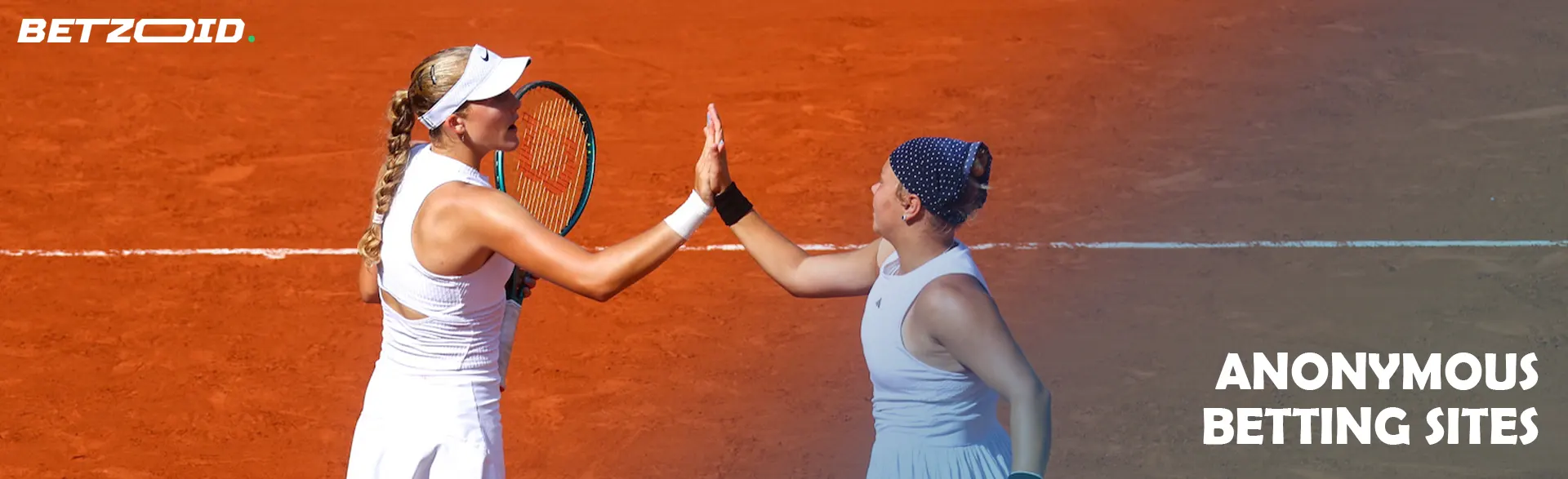 Two tennis players high five before the match.