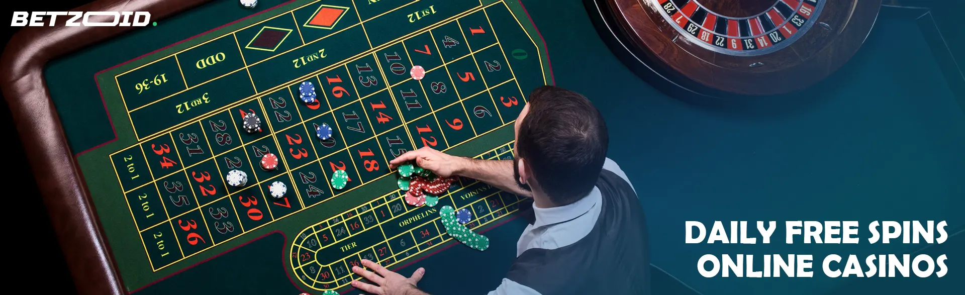 The croupier lays out the chips on the roulette table.