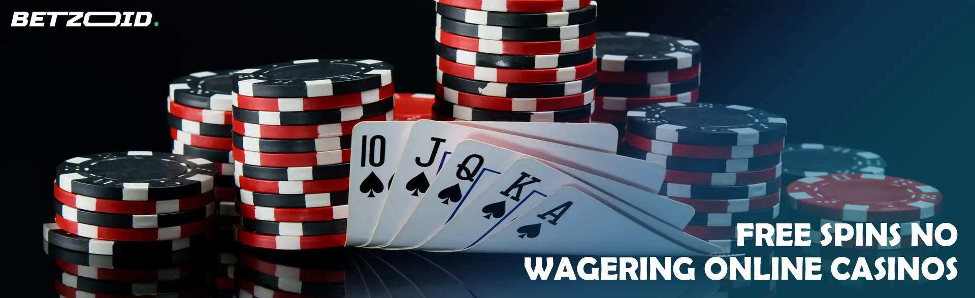 Pile of chips and cards on a dark background.