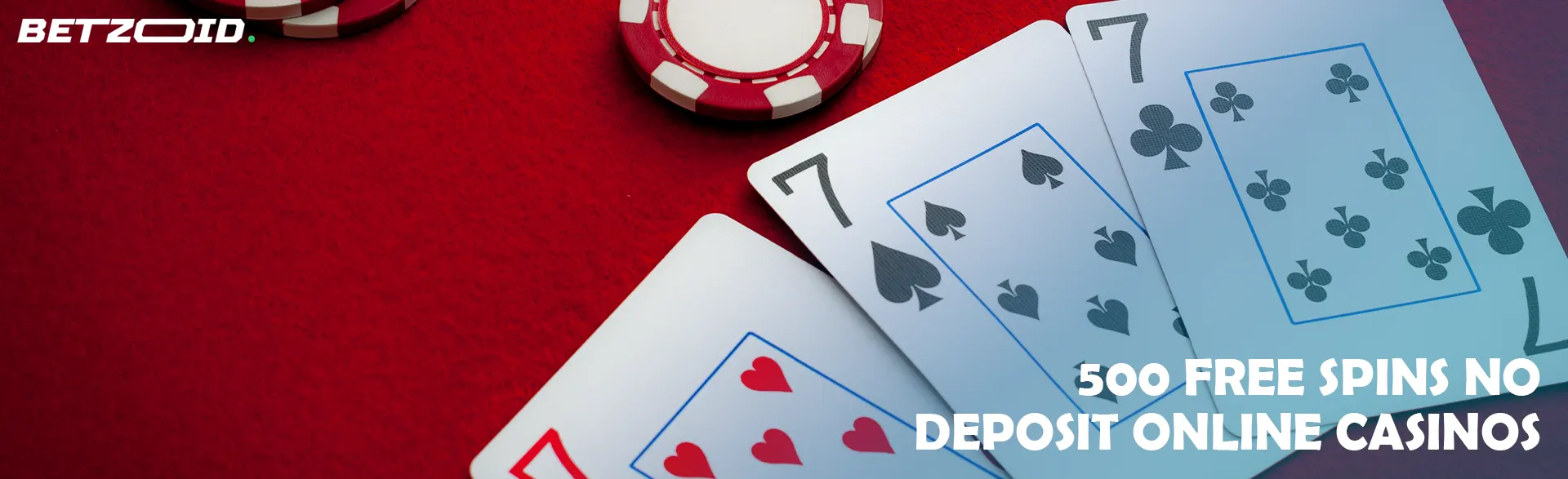 Cards and chips on a red table.