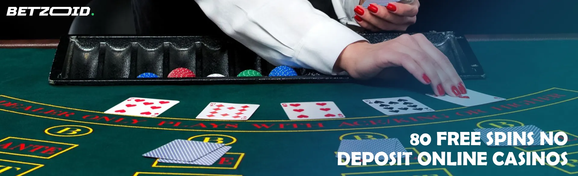 The croupier lays out the cards on the casino table.