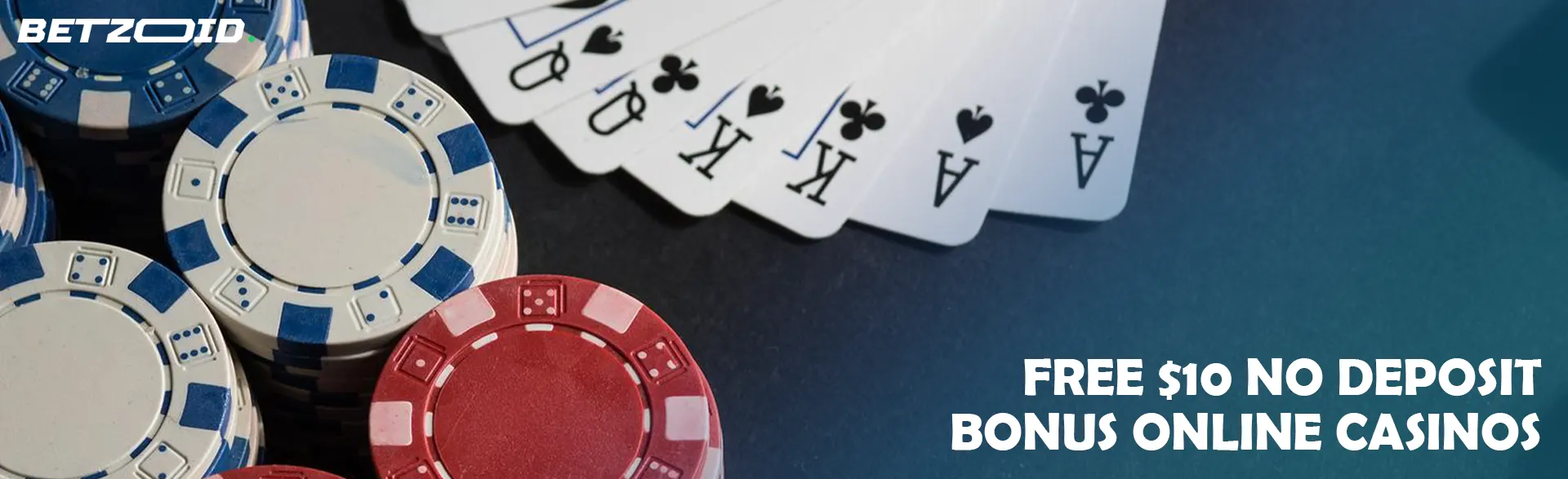 Playing cards next to casino chips.