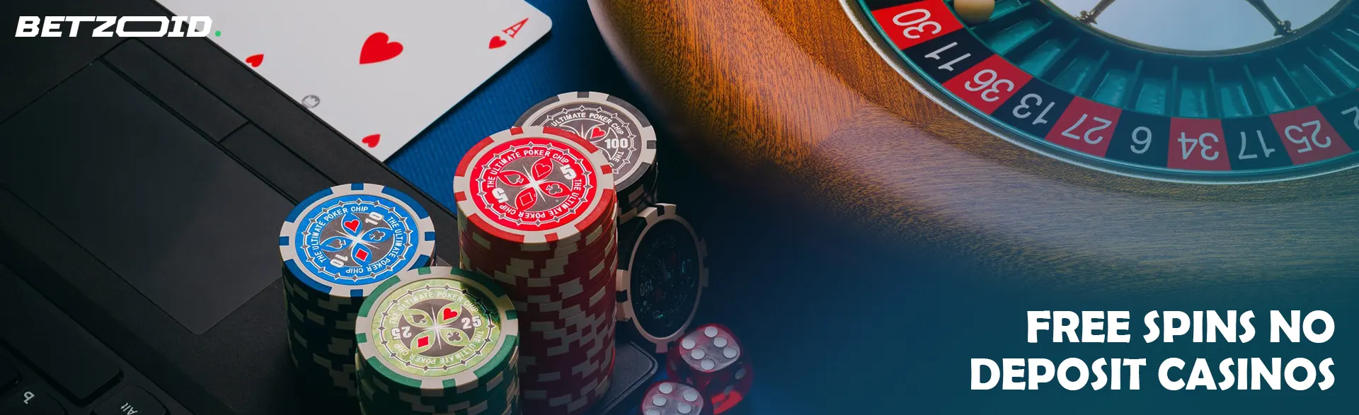 Roulette and cards along with casino chips on the keyboard. 