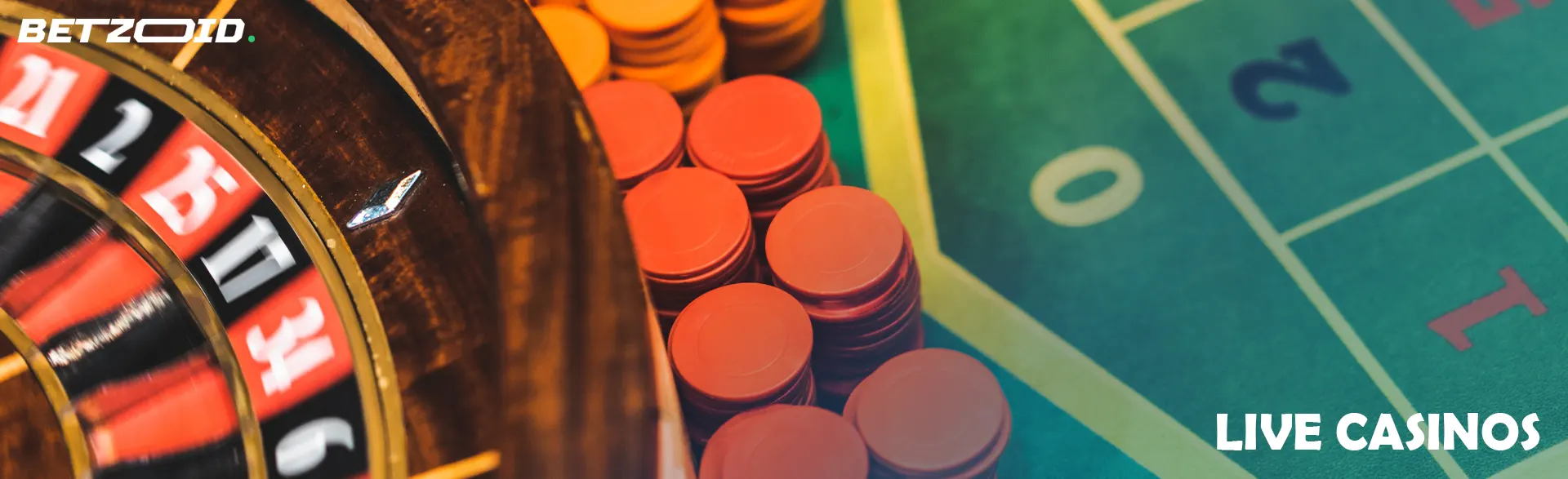 Roulette wheel next to casino chips.