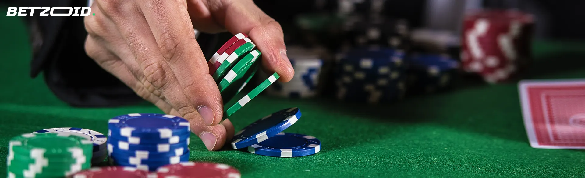 The player places chips on the casino table.