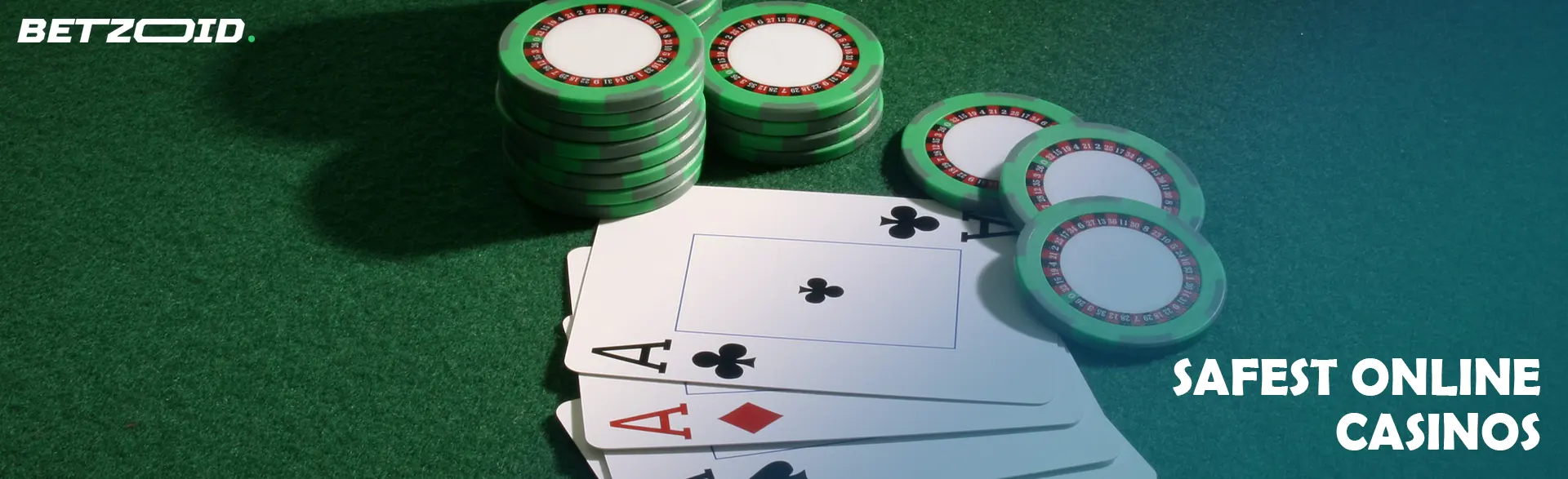 Chips and cards on a green table.