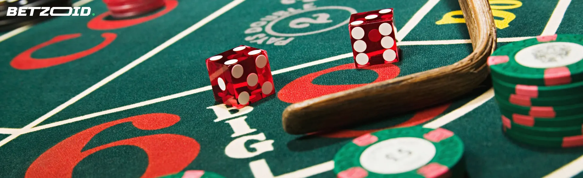 Playing dice and chips on the casino table.