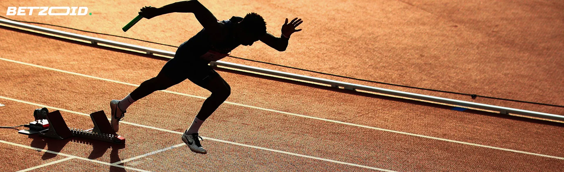 The runner starts with the baton.