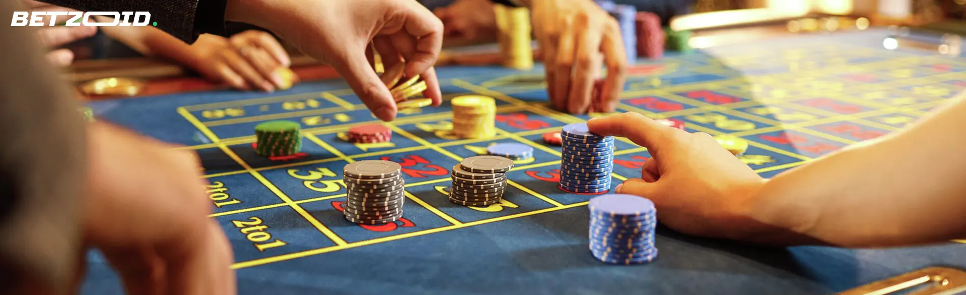 Les joueurs placent des paris sur la table du casino.