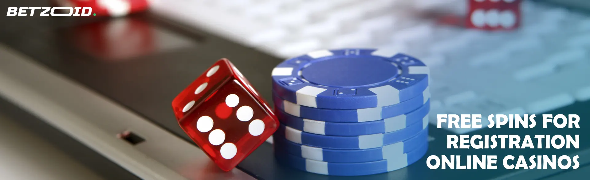 Casino chips and dice on the keyboard.