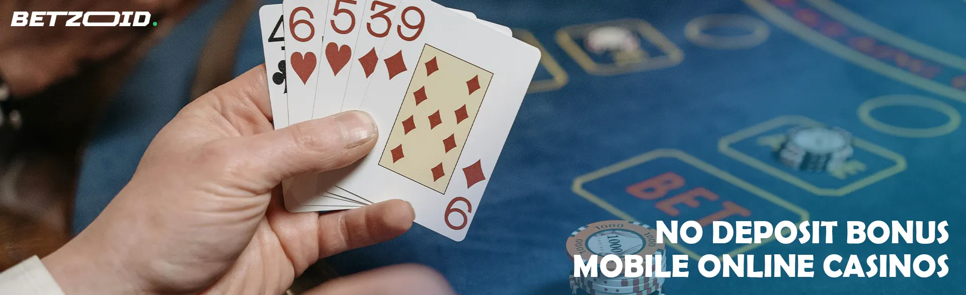 The player keeps the cards next to the casino table.