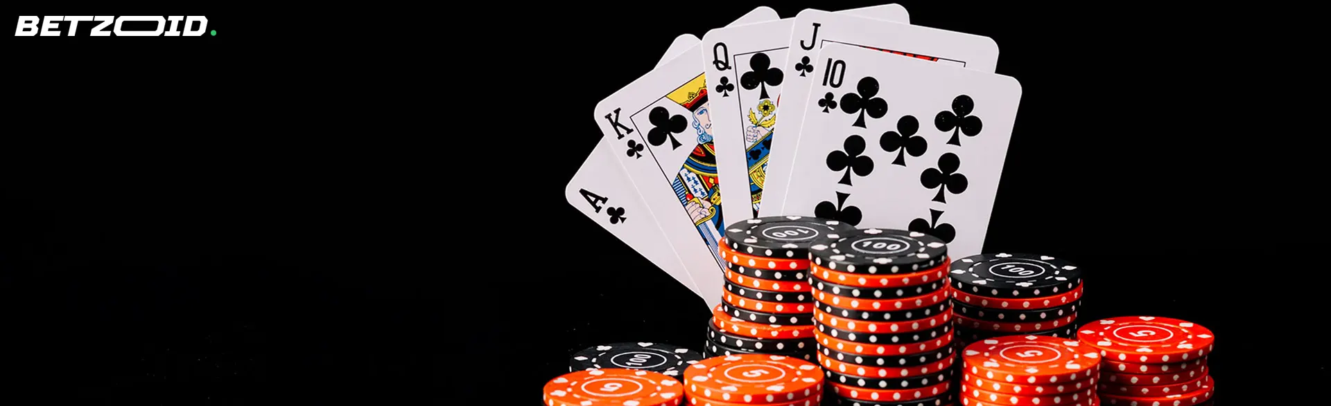 Cartes et jetons sur fond sombre.