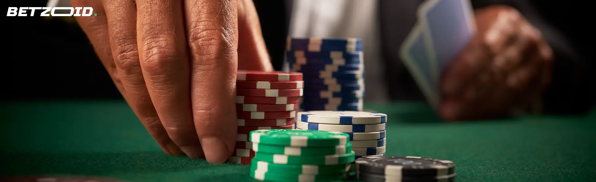 O jogador coloca as fichas à sua frente.