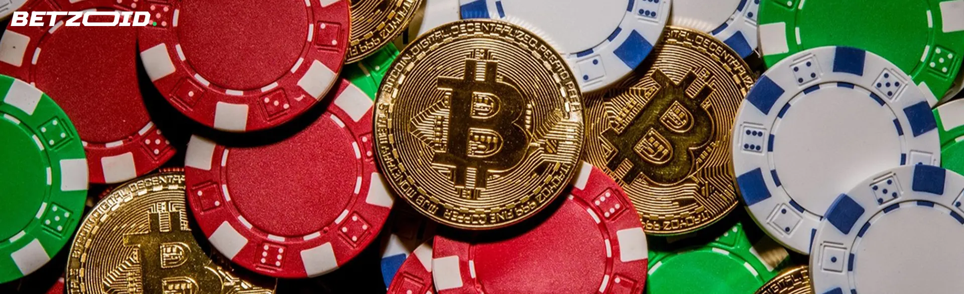 Bitcoin cryptocurrency coins next to casino chips.
