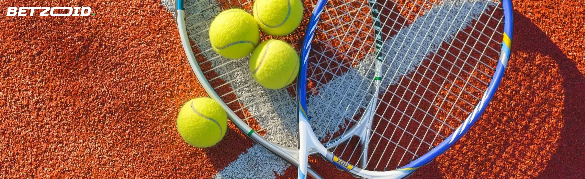 Tennis balls lie on rackets.