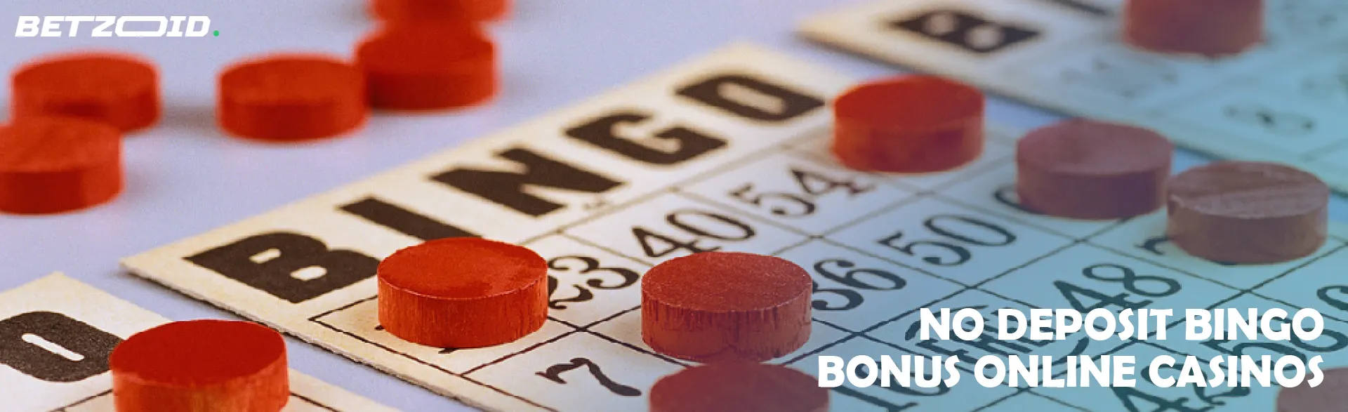 Bingo cards with red chips on them.