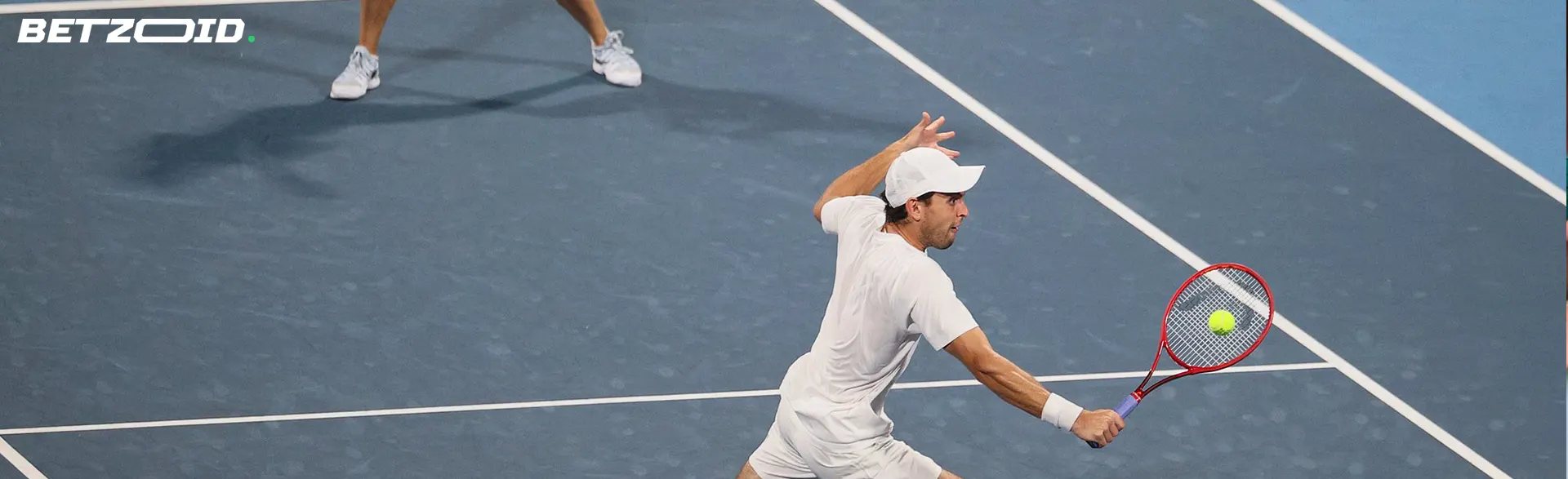 Tennis players in action during a match.