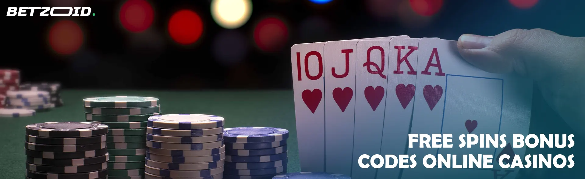 The player holds the cards next to the casino chips.