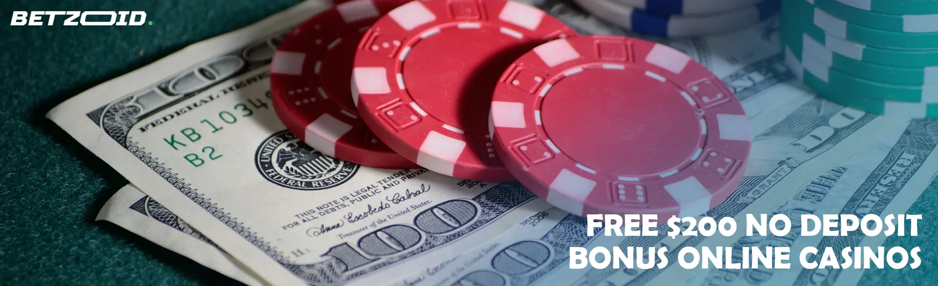 Casino chips lie on bills.