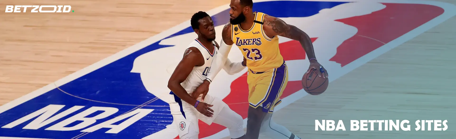 Basketball players in action during the game.
