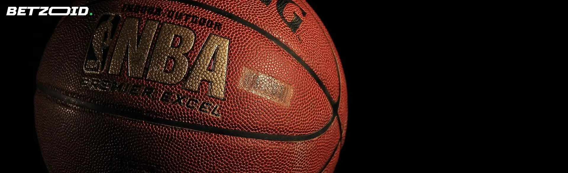 Basketball on a dark background.