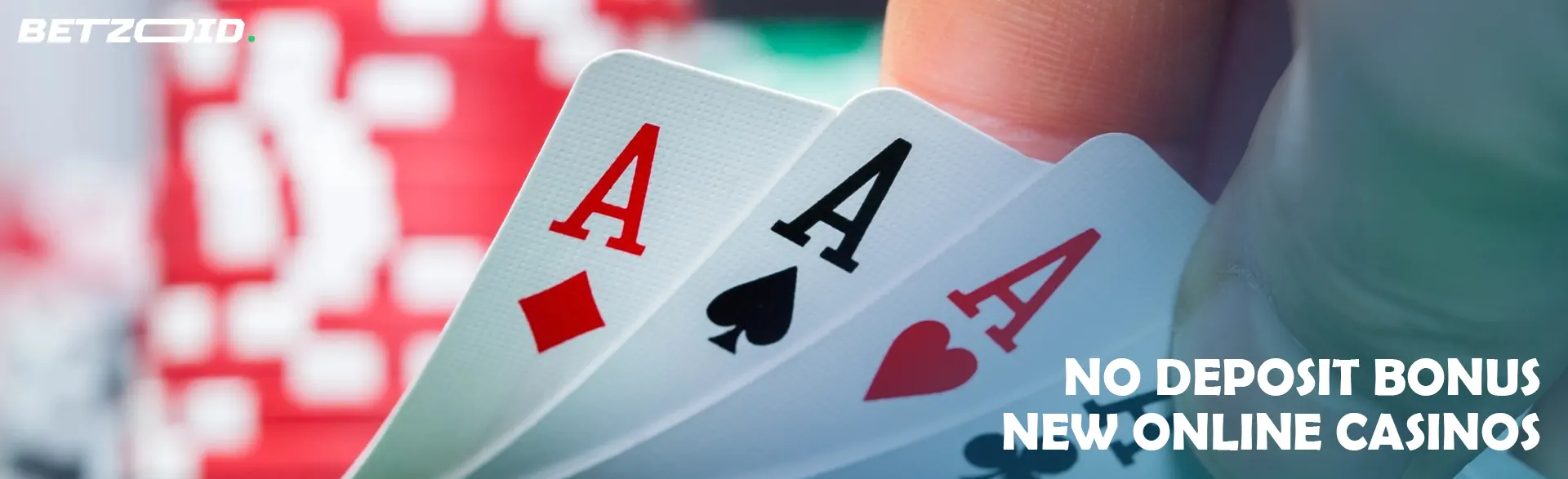 The player holds cards on the background of casino chips.