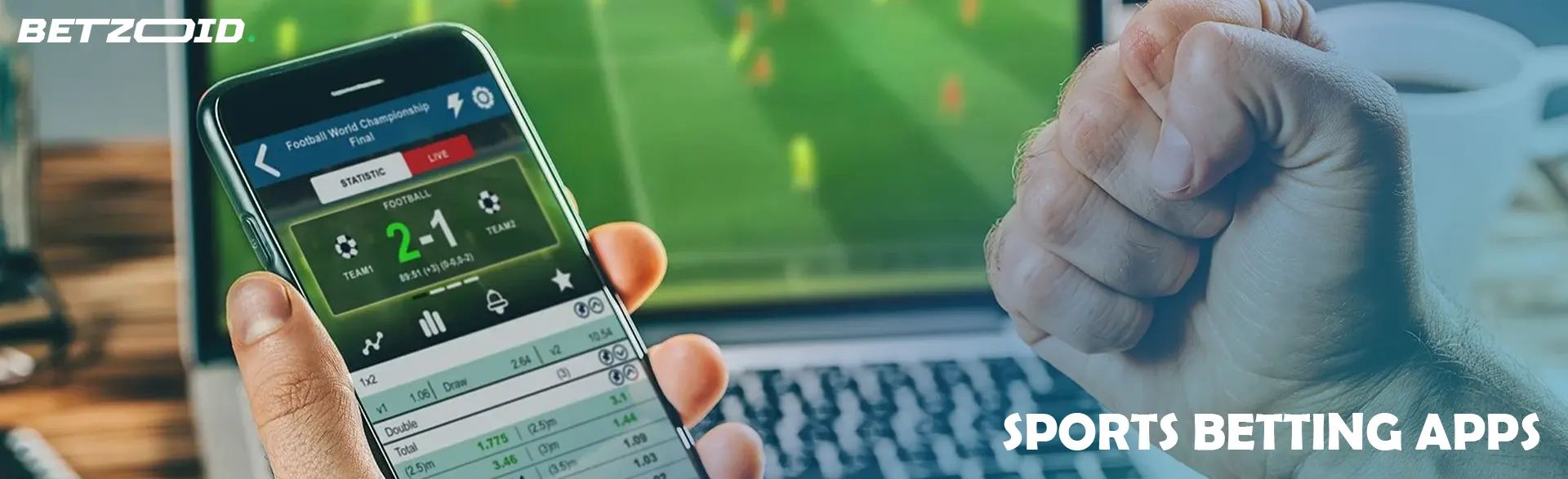 A man is holding a smartphone with a betting application.