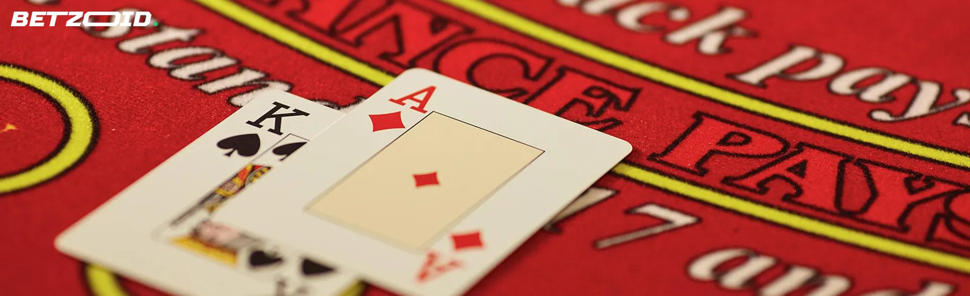Two cards on a casino table.