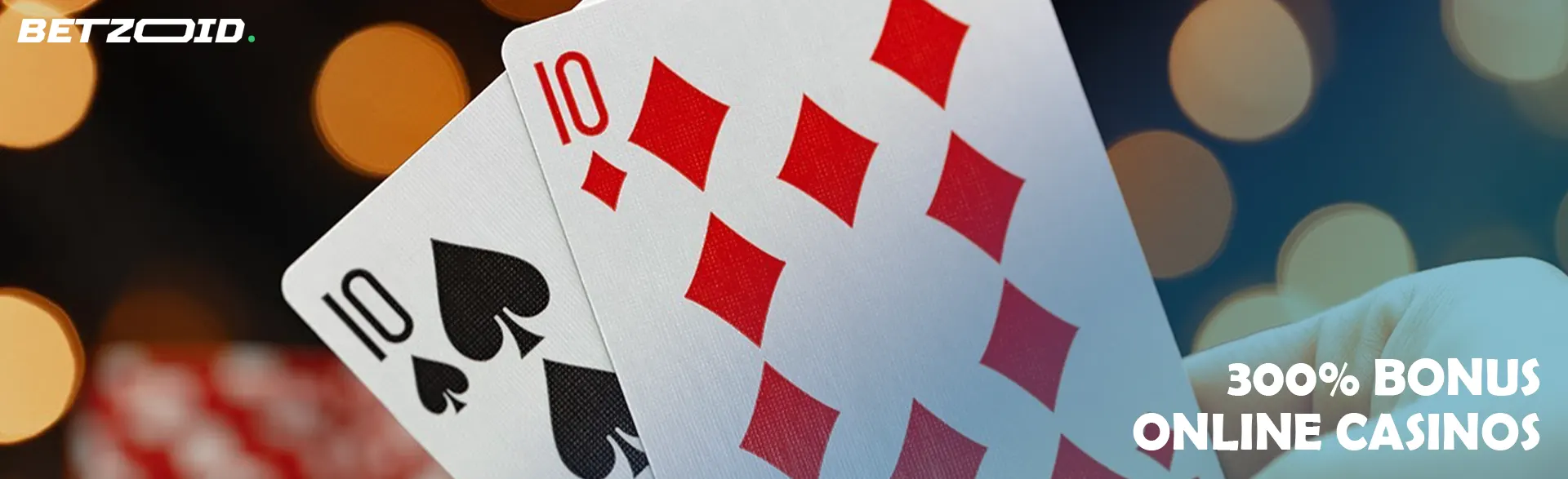 Two cards against the background of casino lights.