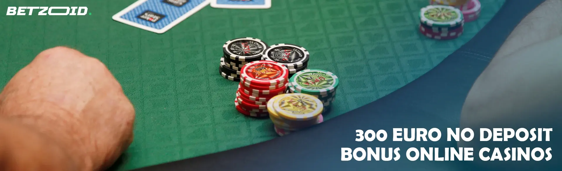 Cards and chips on a casino table.
