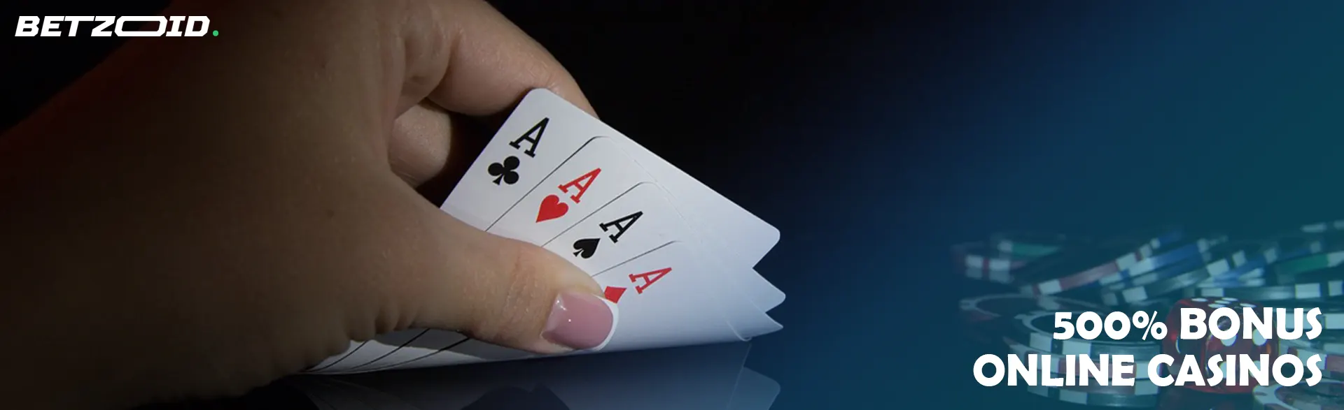 The player holds cards next to casino chips.