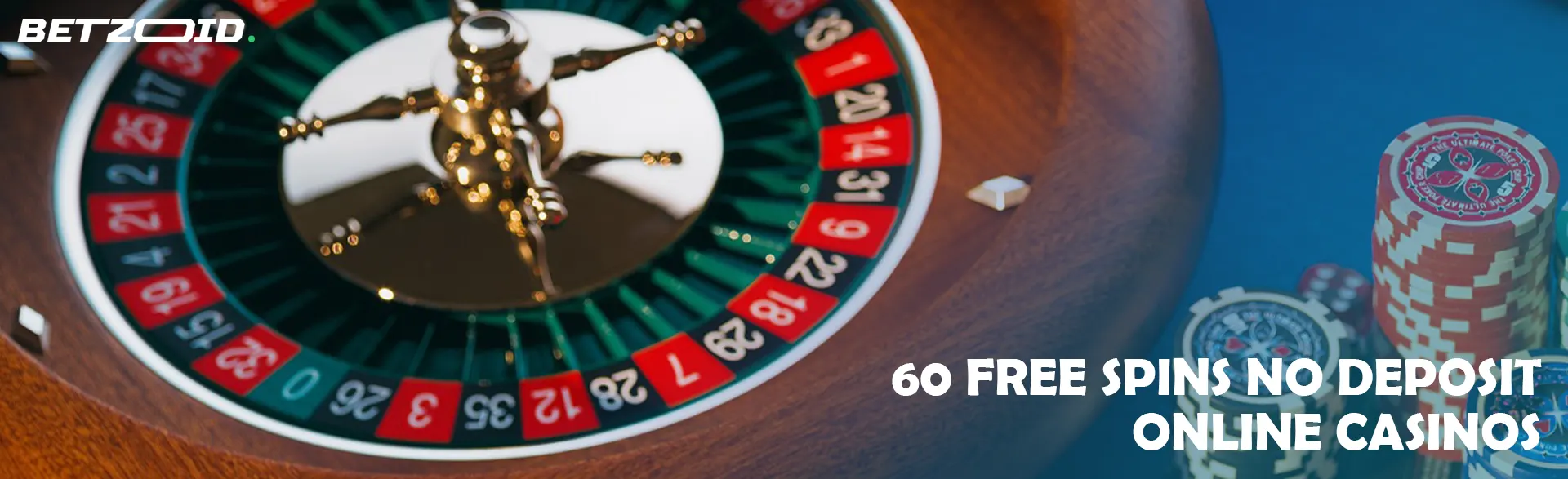 Roulette wheel next to casino chips.