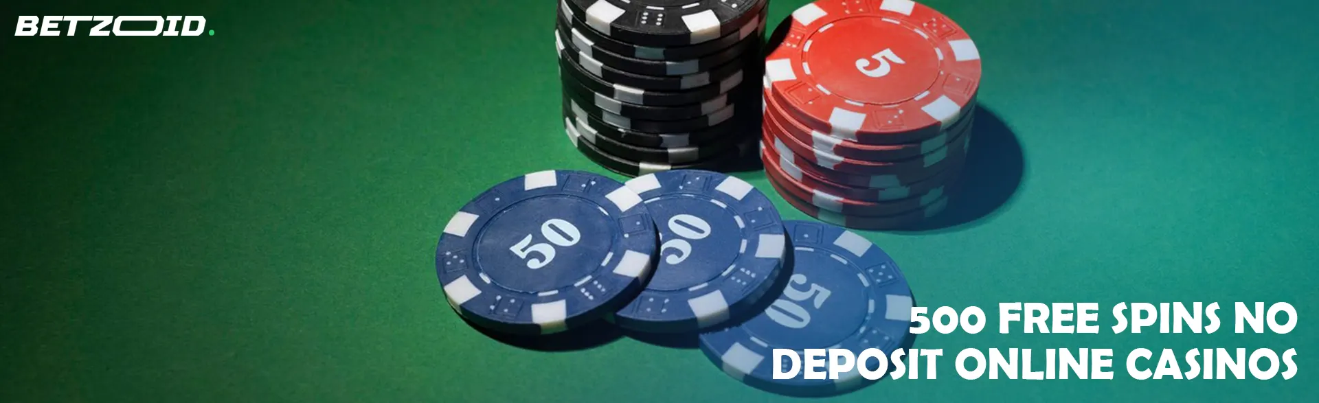 Chips of different denominations on a green table.