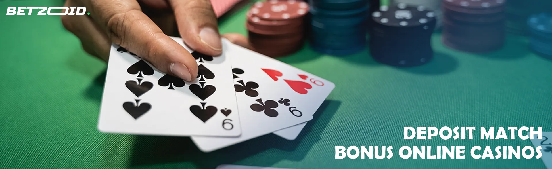 The player holds cards next to casino chips.