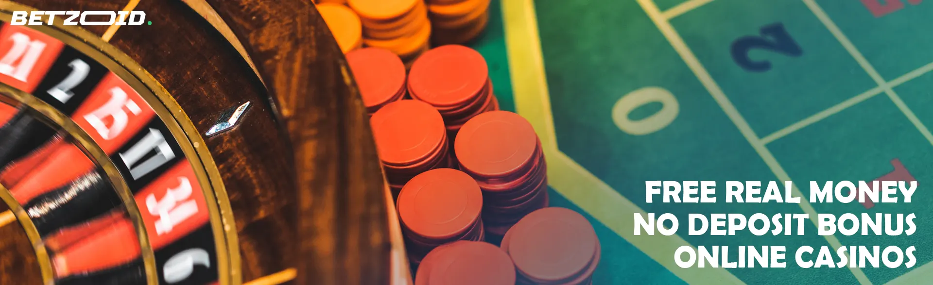 Roulette wheel next to casino chips.